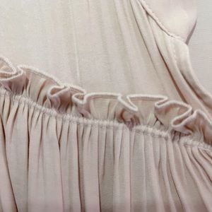 Pink ruffled tank top